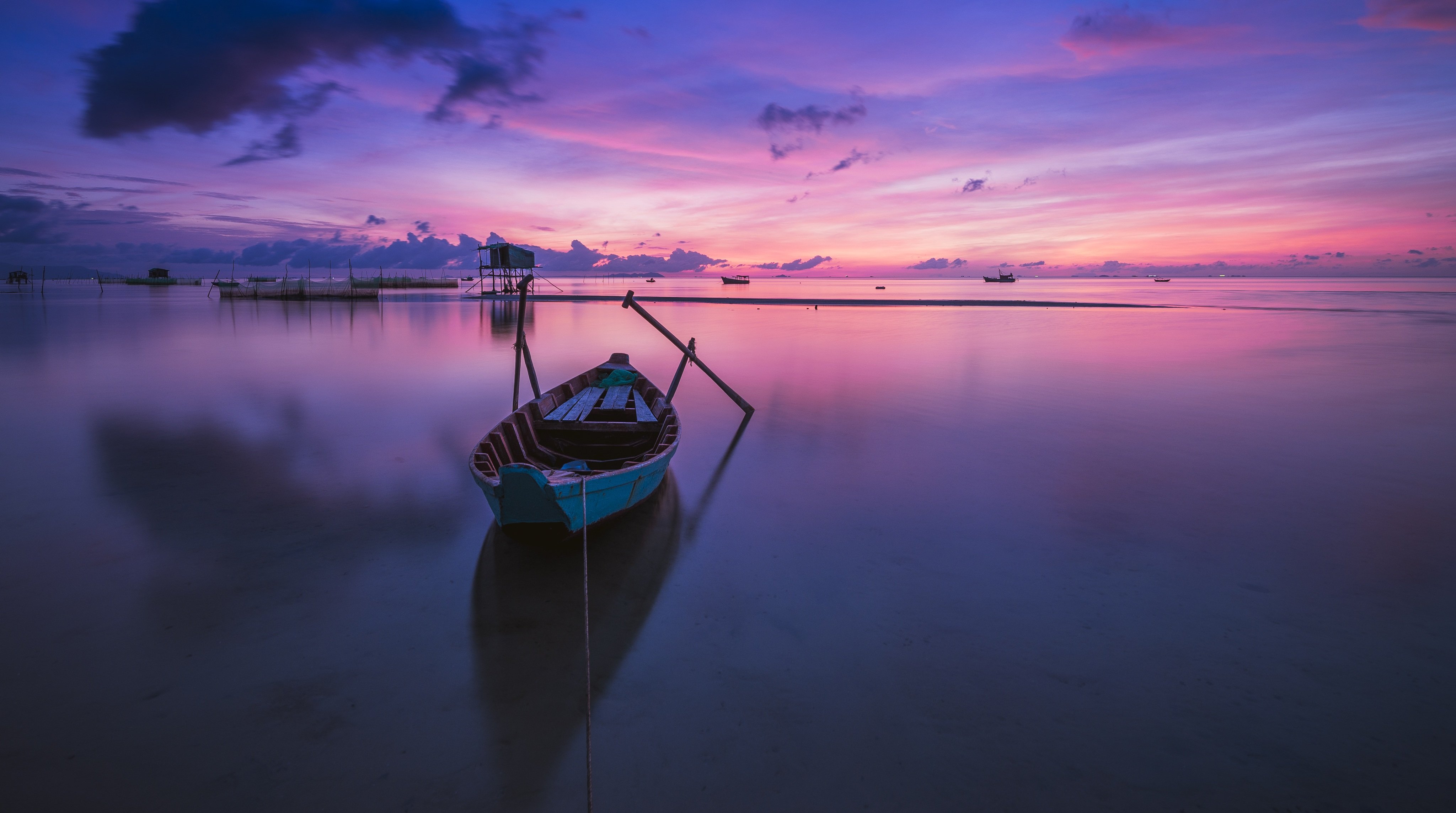 rowboat-on-sea-at-sunset.jpg